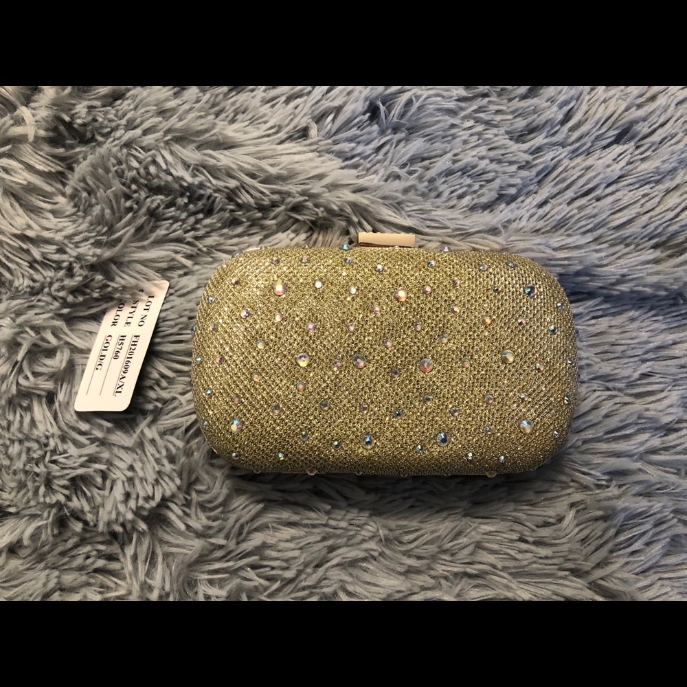 Bnwt gold diamond clutch